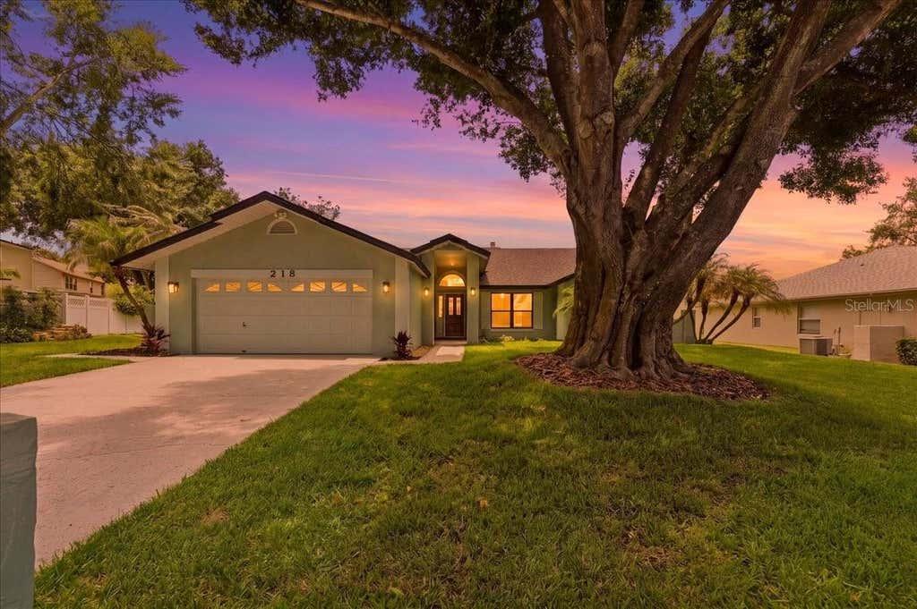 Photo of 218 Lake Hartridge Drive NW, Winter Haven, FL 33881 (MLS # TB8538203)