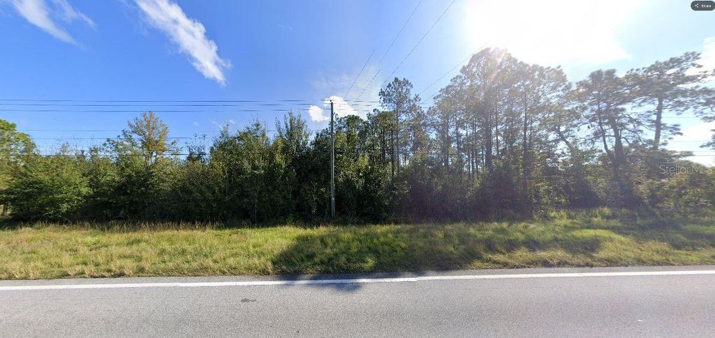 Photo of Old Grade Rd, Polk City, FL 33868 (MLS # O6265124)