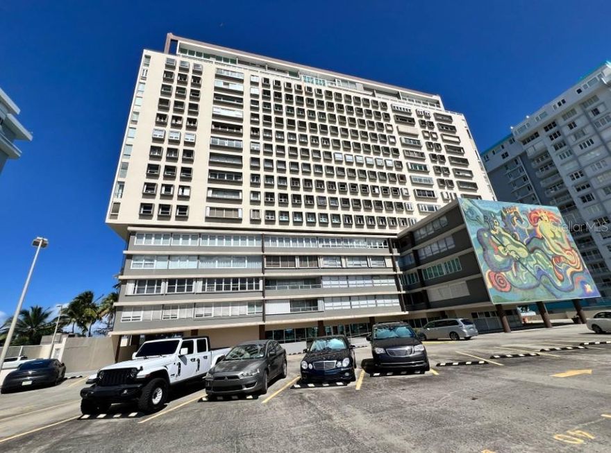 Beautiful 12th-floor apartment at Surfside Mansion in Isla Verde, featuring 2 bedrooms, 2 bathrooms, and a stunning lagoon view. The property offers direct beach access, pool, two gyms, library, social area with gazebo and BBQ, playground, and both underground and exterior parking. It includes a central chiller A/C system and remodeled bathrooms. The building will soon have a full power generator—installation is already underway. Enjoy the coastal lifestyle and luxury amenities this exclusive condominium in Isla Verde has.