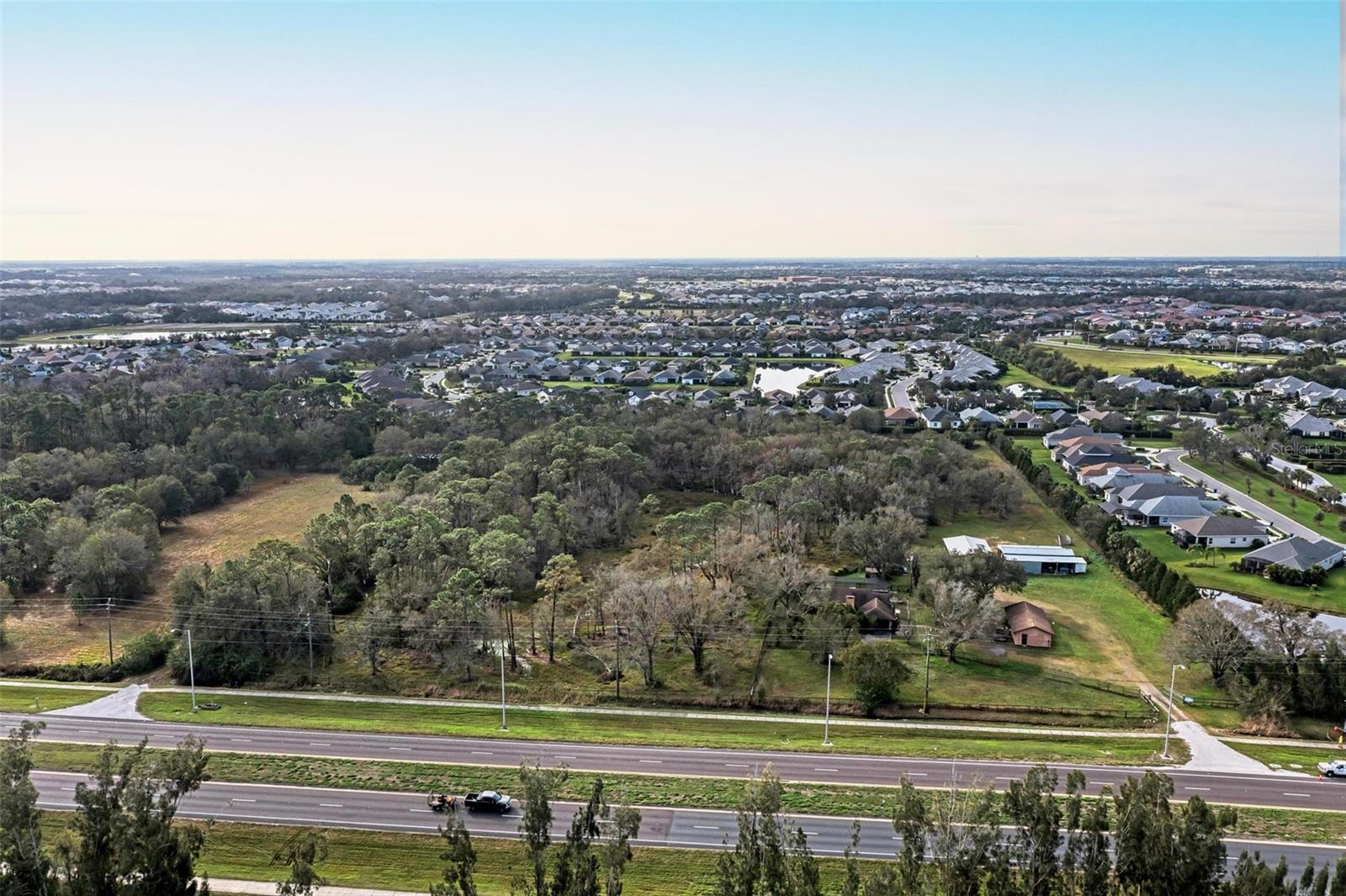 Do not miss this MASSIVE POTENTIAL opportunity to own highly desired land in the expanding Lakewood Ranch area of SR 64. This property is located between the Eagle Trace Community and the Pope Road roundabout with the newly built Publix plaza. This parcel is 10+/- acres. The property is surrounded by thousands of homes and is just waiting to be developed. This property is currently zoned A with future land use UF-3. There are two separate properties for sale side by side that must be sold together. Please see the accompanying listing 12310 SR 64 E for the other parcel for sale. Please do not go to this property without a confirmed appointment.