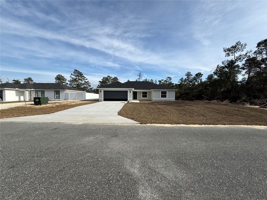 Photo of 3073 SW 168th Loop, Ocala, FL 34473 (MLS # OM719561)