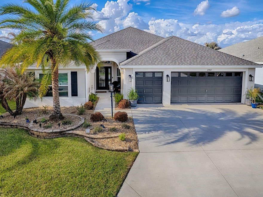 Nestle into this lovely Begonia 5 model located in the great location of Bradford, which is a 4-minute golf cart ride to Sawgrass and a 10-minute golf cart ride to Eastport!  Easy access to Magnolia shopping center and many recreation centers and Villages activities make this the perfect location!  This gorgeous home has been professionally decorated and offers elegant touches such as high-end wallpaper accent walls, extensive millwork, custom paint, PLANTATION SHUTTERS, CROWN MOLDING, upgraded light fixtures, QUARTZ COUNTERS THROUGHOUT, under cabinet lighting, maple cabinets, all tile floors (NO CARPET), EXTENSIVE UPGRADED LANDSCAPING and LANDSCAPE LIGHTING, and the list goes on.  For your relaxation and entertaining enjoyment, the lanai has been painted and there is a large IN-GROUND SALTWATER POOL!!  Be sure to put this home on your list to see soon!