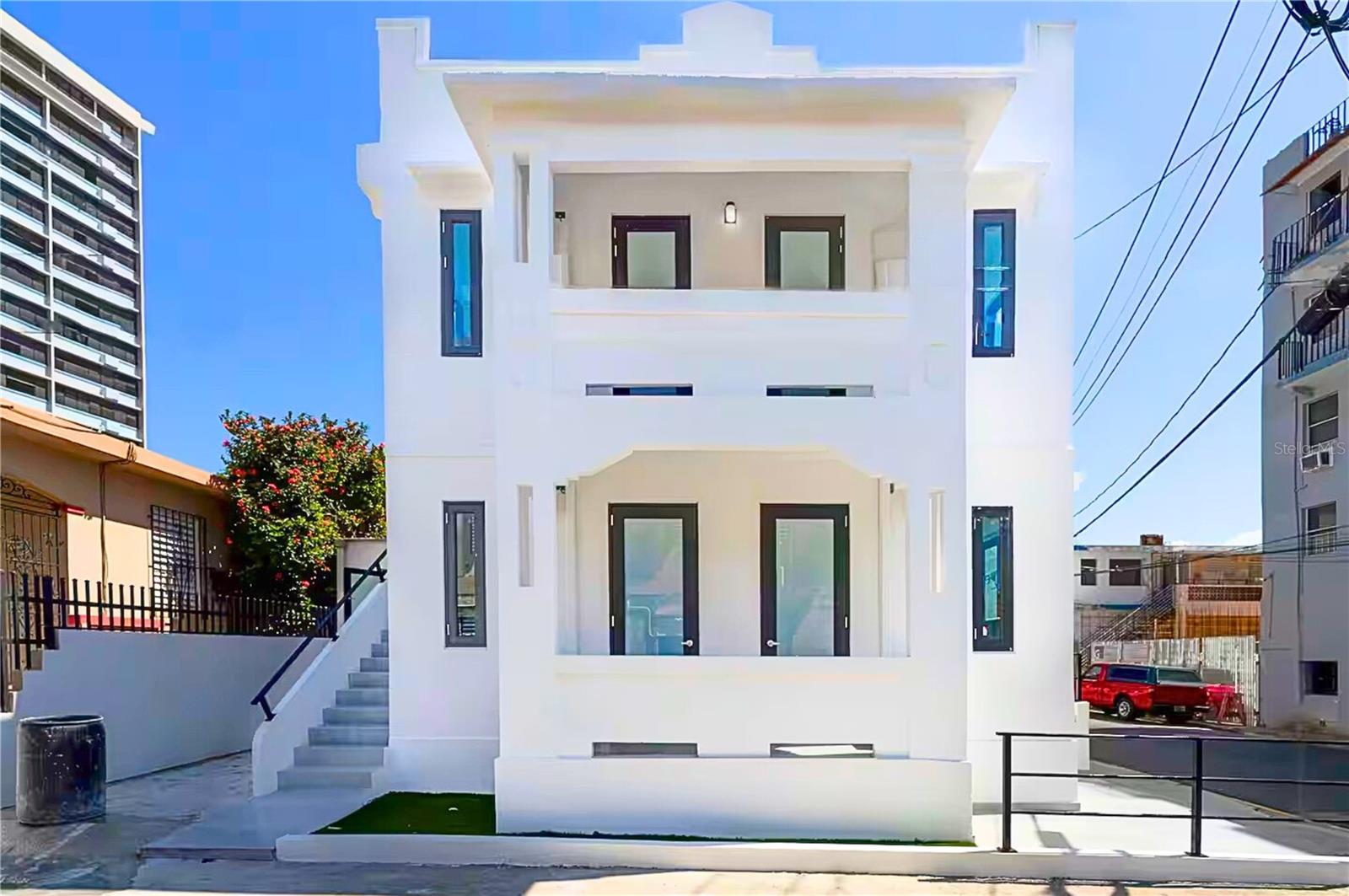 Located at Calle Delbrey, San Juan, PR, this spacious multifamily residence is a solid, smart investment offering immediate income and strong rental potential. With approximately 2,400 sq. ft. of living space on a 203 m² lot, the property features 5 bedrooms, 4 bathrooms, a remodeled kitchen, comfortable layout, and gated parking.
Start earning from day one with 4 rental-ready units:
(2) Three-bedroom / one-bath apartments
(1) Studio apartment
(1) One-bedroom / one-bath apartment
Generating approximately $14,000/month in rental income – ideal for both long-term and short-term (Airbnb) rentals.
Prime Location near hospitals, main roads, and shopping centers ensures high demand and consistent cash flow.
Immediate Income Stream.
CASH FLOW FROM DAY 1
Prime Location
Solid, Smart Investment
Secure your next income-producing property today.
Let your money work for you!