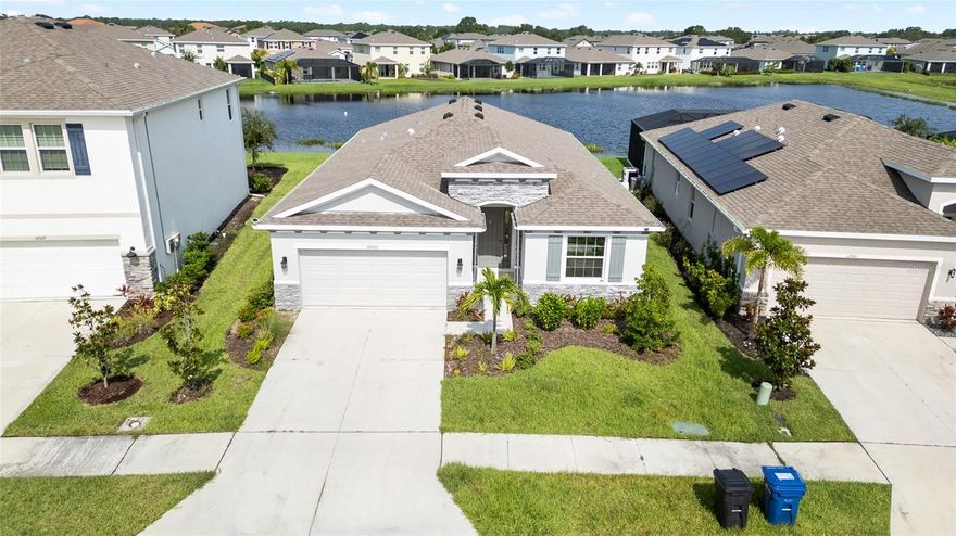Welcome to Promenade Estates at Palmer Ranch ! This 4 bedroom,2.5 bathroom home by DR Horton , gated community has many amenities which include a resort pool, splash pad, playground,harmony park, flex field, basketball ,sand volley ball, fitness center, covered pavilion, grilling, and gulf cart parking, dog park for your furry pets.There is low HOA fee with no CDD All concrete block constructed two-car garage home has open concept floor plan, featuring a spacious kitchen overlooking large living and dining areas that flow out to an oversized covered lanai , great water view . It is only 9 miles drive to gulf beaches and 12 miles drive to downtown Sarasota, easy access to I75 TO SEE THIS BEAUTIFUL HOME ,CALL TODAY TO SCHEDULE A SHOWING !!!