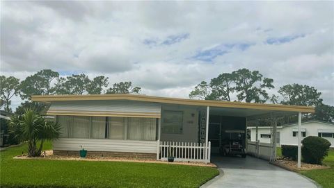 Photo of 106 Dogwood Trail, Leesburg, FL 34748 (MLS # R4909854)