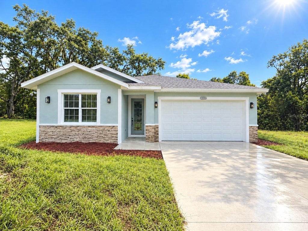 Photo of 13899 SE 53rd Terrace, Summerfield, FL 34491 (MLS # OM733556)
