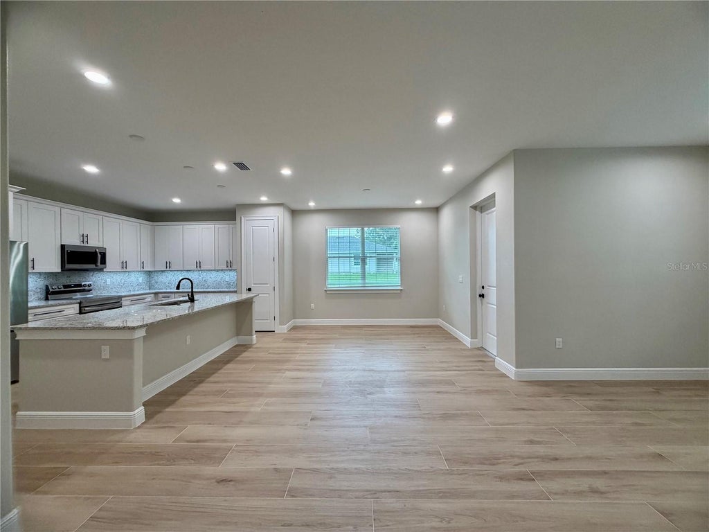 Photo of 13899 SE 53rd Terrace, Summerfield, FL 34491 (MLS # OM733556)