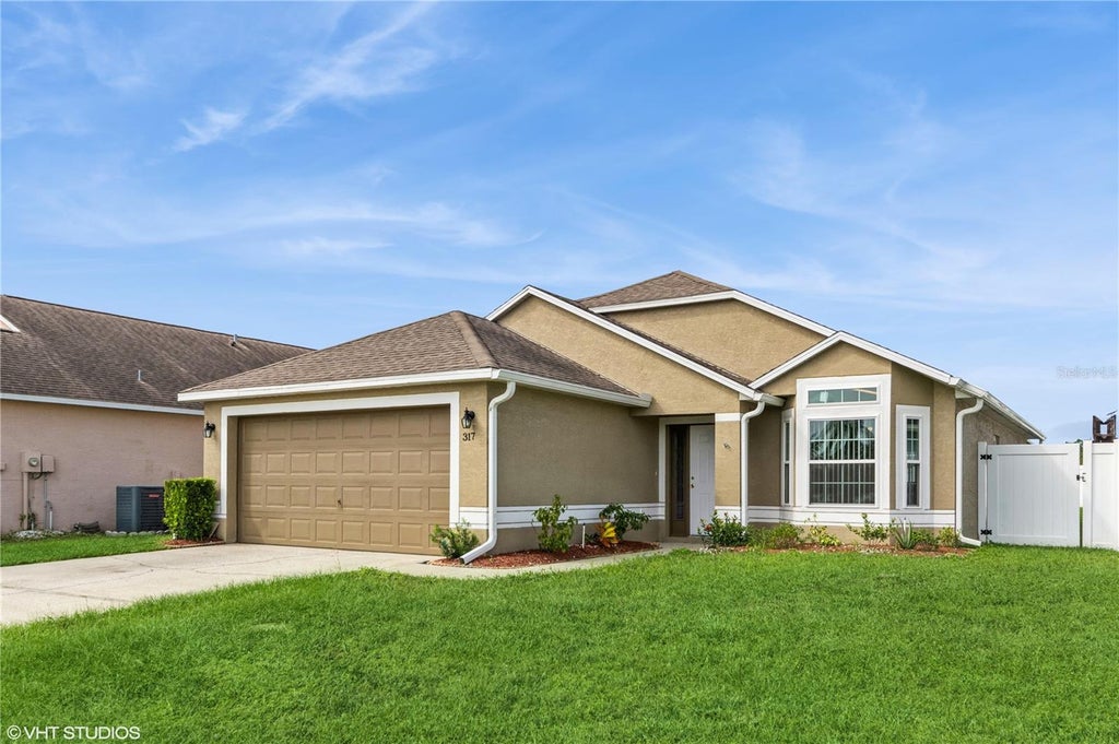 Photo of 317 Majesty Drive, Davenport, FL 33837 (MLS # O6447194)