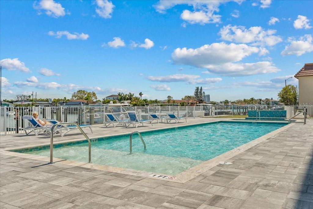 Photo of 415 Island Way #303, Clearwater Beach, FL 33767 (MLS # TB8383596)