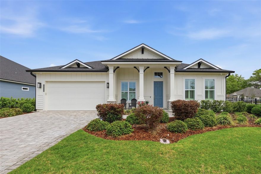 From the moment you arrive, there’s an immediate sense that this home is different. It’s not just the space or the upgrades, it’s the way everything comes together to feel welcoming, elevated, and truly move-in ready. Set on a rare oversized corner lot, just under 1/3 of an acre, this property offers a sense of space and privacy that is increasingly hard to find. It lives like new construction, but with more land, abundant upgrades, and a level of completeness that allows you to move in and immediately enjoy. Inside, the layout strikes a perfect balance between comfort and functionality. With 3 bedrooms, 3 bathrooms, plus a dedicated study and a versatile bonus room, the home adapts beautifully to the way you live. The split floor plan creates separation where you want it, while the open concept design encourages connection in the main living spaces. Extra high ceilings and plentiful natural light enhance the sense of openness, giving each room a bright and welcoming feel. At the center of it all, the kitchen is designed to bring people together. The oversized quartz island anchors the space, complemented by a farmhouse sink, Viking gas cooktop, double ovens, and a generous walk-in pantry. Just beyond, the dining room is ready for everything from holidays to intimate evenings, creating a natural extension of the home’s entertaining flow. Adjacent to the kitchen and walk-in pantry is a well placed drop zone, which adds an extra layer of ease, keeping everyday life organized without effort. The primary suite offers a true retreat at the end of the day, with a roomy walk-in closet, a spacious shower, dual sinks, dedicated vanity space, and a private water closet. Touches like a tankless water heater add comfort and efficiency in ways that matter over time. Throughout the living areas and bedrooms, luxury vinyl plank flooring provides both durability and a clean, cohesive aesthetic. Just beyond the living space, the nesting sliding doors, which blur the line between indoor and outdoor spaces, allow the Florida lifestyle to shine. The screened paver patio, plumbed for a gas grill, creates a comfortable, shaded space to unwind, while the extended uncovered patio opens up even more possibilities, perfect for outdoor dining, weekend grilling, or simply enjoying the sun. The landscaped and fully fenced yard offers plenty of room for a future pool, making it easy to bring your vision of paradise to life. Practical features are just as seamlessly incorporated, including a 3 car garage wired for an EV charger, whole-house surge protector, wiring for cameras, a paver driveway, and upgraded, move-in ready finishes throughout. Every detail contributes to a home that feels both grand and easy to live in. Beyond the home itself, life in one of Gainesville’s most desirable neighborhoods, Oakmont,  offers something truly unique. Residents enjoy access to a beautifully designed clubhouse, a fully equipped fitness center, tennis and pickleball courts, and an oversized resort-style pool with a separate splash area. Walking paths, playgrounds, and expansive green spaces surrounded by protected natural areas create a setting that feels both active and serene. All of this, just minutes from Tioga Town Center and Haile Village Center, with convenient access to golf, dining, medical facilities, and everyday essentials. Beyond its features, this home delivers a lifestyle that is effortless, sophisticated, and hard to replicate.