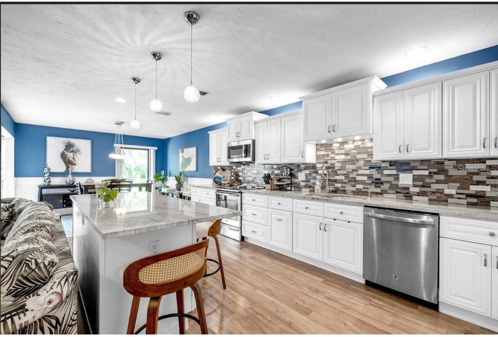 Photo of 3458 Wilkinson Woods Drive #2, Sarasota, FL 34231 (MLS # A4708629)