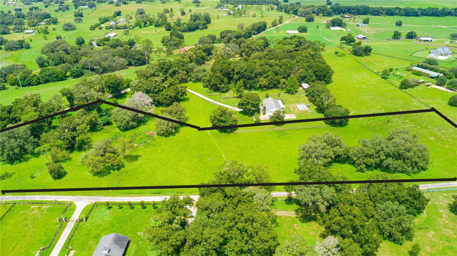 Gorgeous 10 acres for sale in the rolling hills of Trilby with huge grandfather oaks and pretty pasture. Beautiful place to build your farm in this equestrian community. Ride your horses right from the property as it's close to the Withlacoochee State Trail. There are no deed restrictions and no HOA. The owner will finance with 10% down. It's on the corner of Trilby Cemetery and A D May Road. Call or text for the gate code to access A D May Road. Cows have been removed from the property, so feel free to go into the pasture.