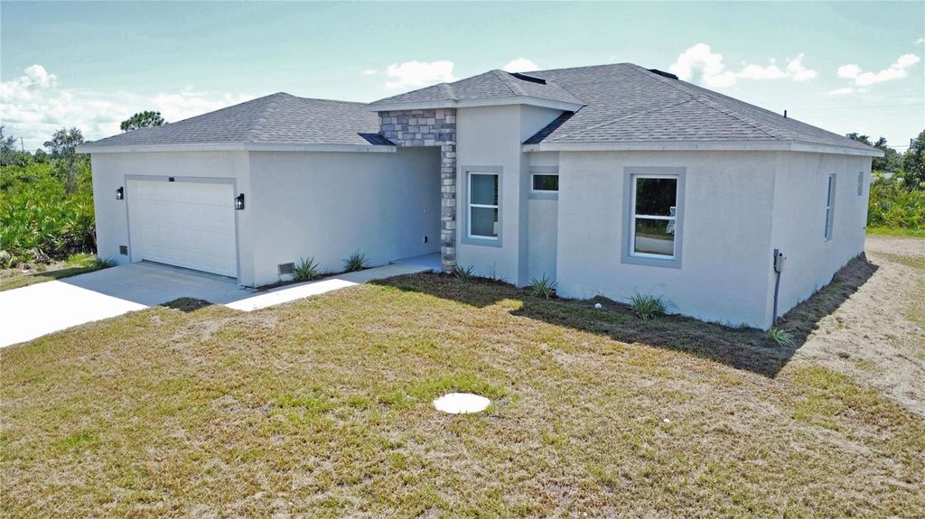 Photo of 13558 Jeronimo Lane, Port Charlotte, FL 33981 (MLS # O6407630)