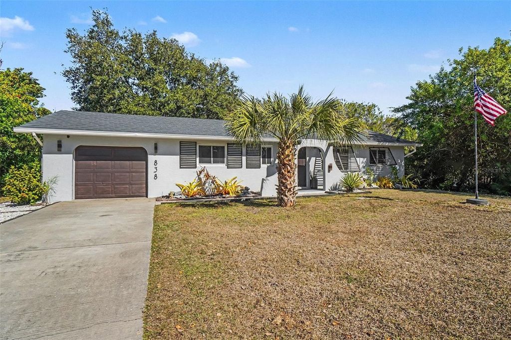 Photo of 838 Spring View Avenue NW, Port Charlotte, FL 33948 (MLS # D6145891)