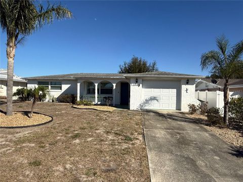 Photo of 11718 Newell Drive, Port Richey, FL 34668 (MLS # TB8473484)
