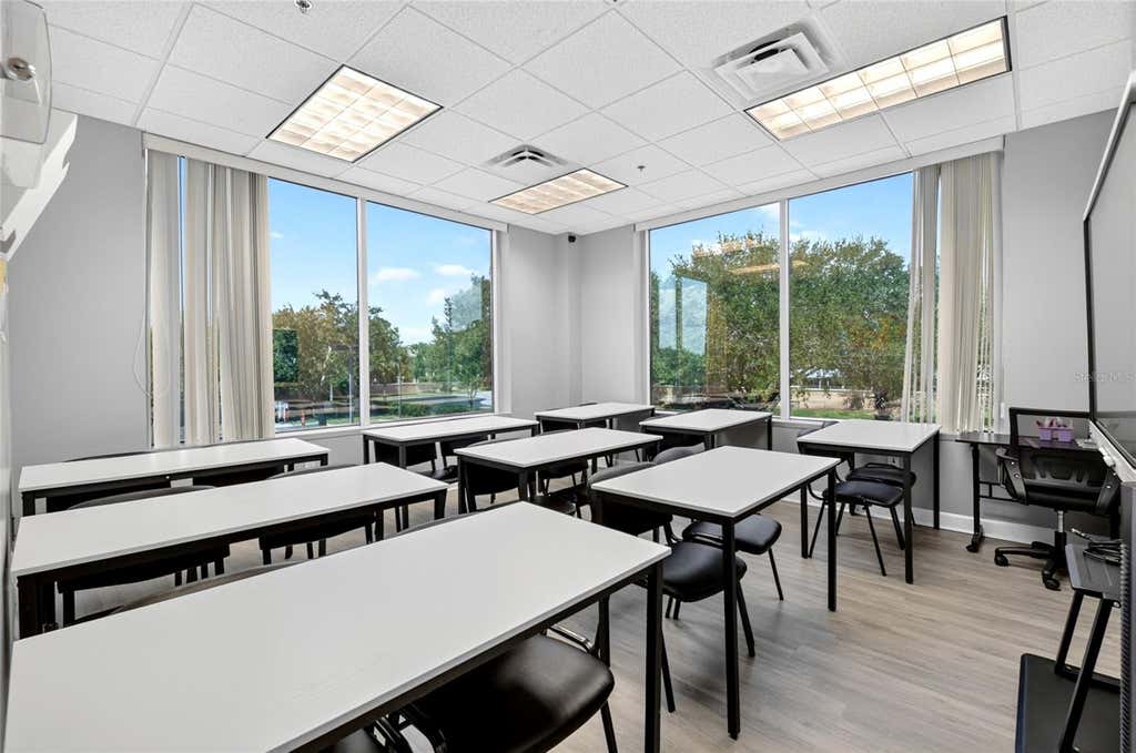 Photo of 6200 Metrowest Boulevard #205, Orlando, FL 32835 (MLS # O6434087)