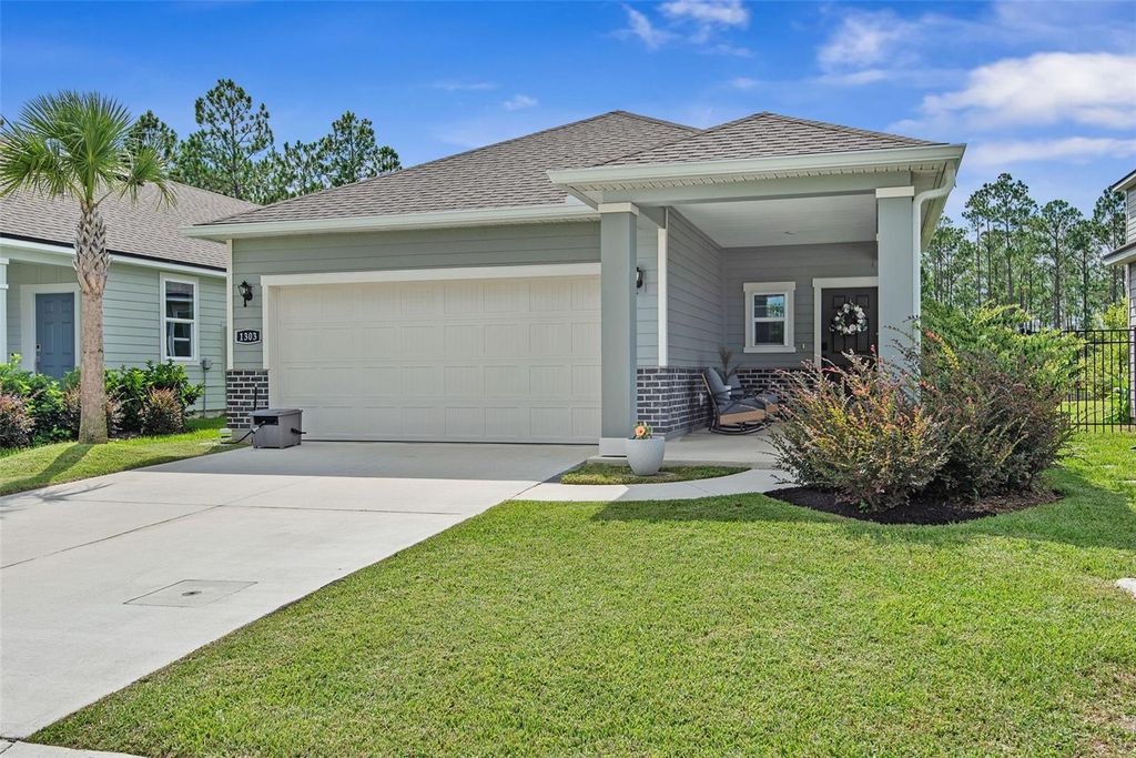 Photo of 1303 Ribbon Place, Palm Coast, FL 32164 (MLS # FC319724)