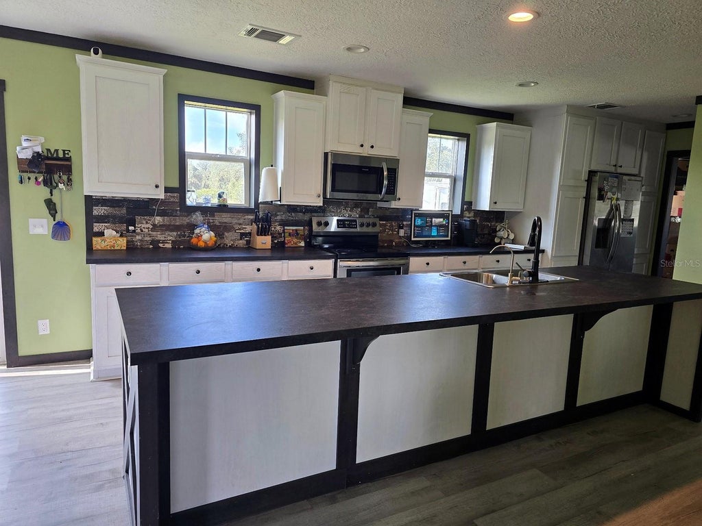 Photo of 4915 Key Deer Avenue, Lake Wales, FL 33859 (MLS # P4939848)