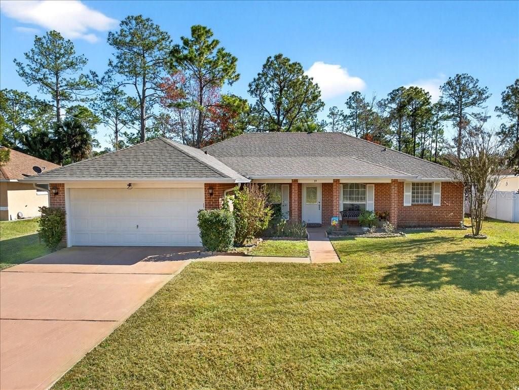 Photo of 39 Princess Dolores Lane, Palm Coast, FL 32164 (MLS # FC315714)