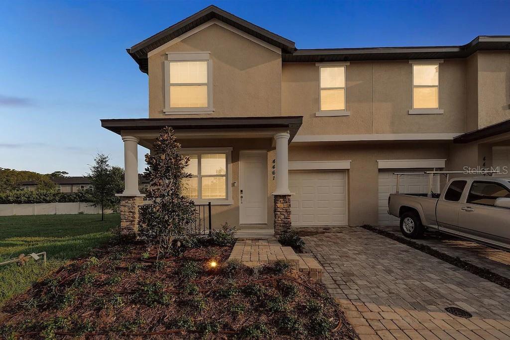 Welcome to one of the most desirable locations in the Summer Flowers Townhomes subdivision! This 4-bedroom, 2.5-bath end unit townhome boasts extra privacy with no neighbors to the west, a premium end unit lot, and tranquil views of the community pool—all just steps from a quiet cul-de-sac. Built in 2022, the spacious and modern layout includes a downstairs flex room perfect for a home office or den, an open-concept kitchen with stainless appliances, and a bright living space with ceramic tile and vinyl flooring throughout. Upstairs, you'll find four generously sized bedrooms, including a 13’ x 14.5’ primary suite with a walk-in closet and in-suite bath. This townhome is fully equipped for short-term rental and is rarely vacant, making it an excellent investment opportunity or a fabulous primary residence. Enjoy the convenience of a 1-car garage, in-unit laundry, and access to a gated community with a sparkling pool, sidewalks and close to everything, including shopping, restaurants, major attractions, etc... This is a truly turn-key home you won't want to miss-come see it today!