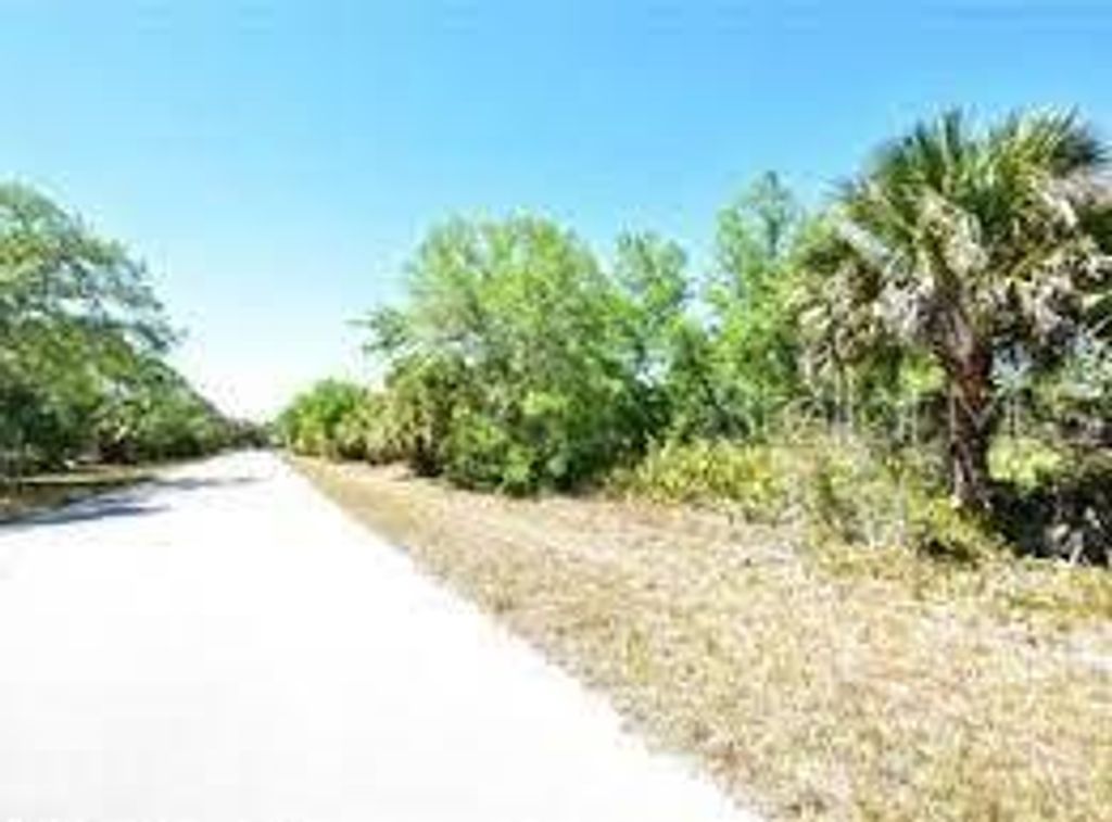 Photo of 17126 Cynthia Lane, Port Charlotte, FL 33948 (MLS # O6338856)