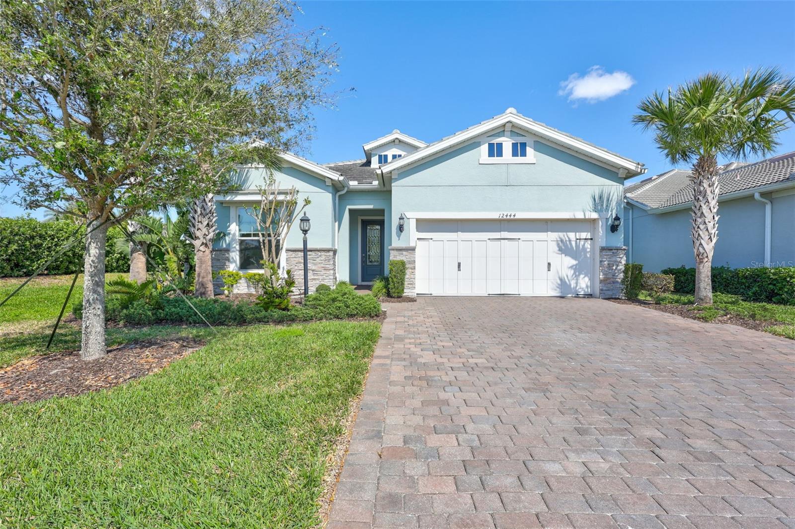 Discover this beautiful and contemporary single-family residence in the highly sought-after Mallory Park community in Lakewood Ranch. This two-bedroom, two-bathroom home also features a versatile den/office that can easily be converted into a third bedroom, offering flexibility to suit your needs.
As you step into this bright and airy home, the foyer welcomes you with an effortless flow into the open-concept gathering room, dining area, and kitchen—all offering scenic backyard views. The house also boasts an extended covered lanai with a fully equipped outdoor kitchen, perfect for entertaining or enjoying a peaceful evening.
The stylish kitchen is a chef's dream, featuring stainless steel appliances, granite countertops, an extended island, and a sleek backsplash. The gas cooktop, breakfast bar, and walk-in pantry provide both convenience and elegance.
The serene owner’s suite, with its plentiful windows, is filled with natural light. It offers double vanities with separate sinks, a spacious walk-in shower, and a magnificent custom-built walk-in closet designed for maximum organization and style.
The second bedroom offers generous natural light and is conveniently located near a full bathroom. The adjacent den/office, with elegant double French doors, provides the perfect space for work, relaxation, or conversion into a third bedroom.
Throughout the home, you’ll find beautiful tile flooring, tray ceilings, and pocket sliding glass doors in the gathering room, creating a seamless connection between indoor and outdoor spaces. The extended two-car garage offers extra storage space, adding to the home’s functionality. Mallory Park is a maintenance-free, gated community in the heart of Lakewood Ranch. It offers resort-style amenities, including a clubhouse, zero-entry swimming pool, a Jacuzzi, pickleball and basketball courts, a fitness center, and a tots area. The community is adjacent to Bob Gardner Park, which offers a dog park, soccer field, zip lines, and trails. A private walking path leads to BD Gullett Elementary School and Mona Jane Middle School. Conveniently located near I-75, international airports, medical facilities, the UTC shopping area, restaurants, entertainment, parks, and world-famous beaches, this home offers the perfect blend of luxury and convenience. Don’t miss out on this excellent rental opportunity in Mallory Park!