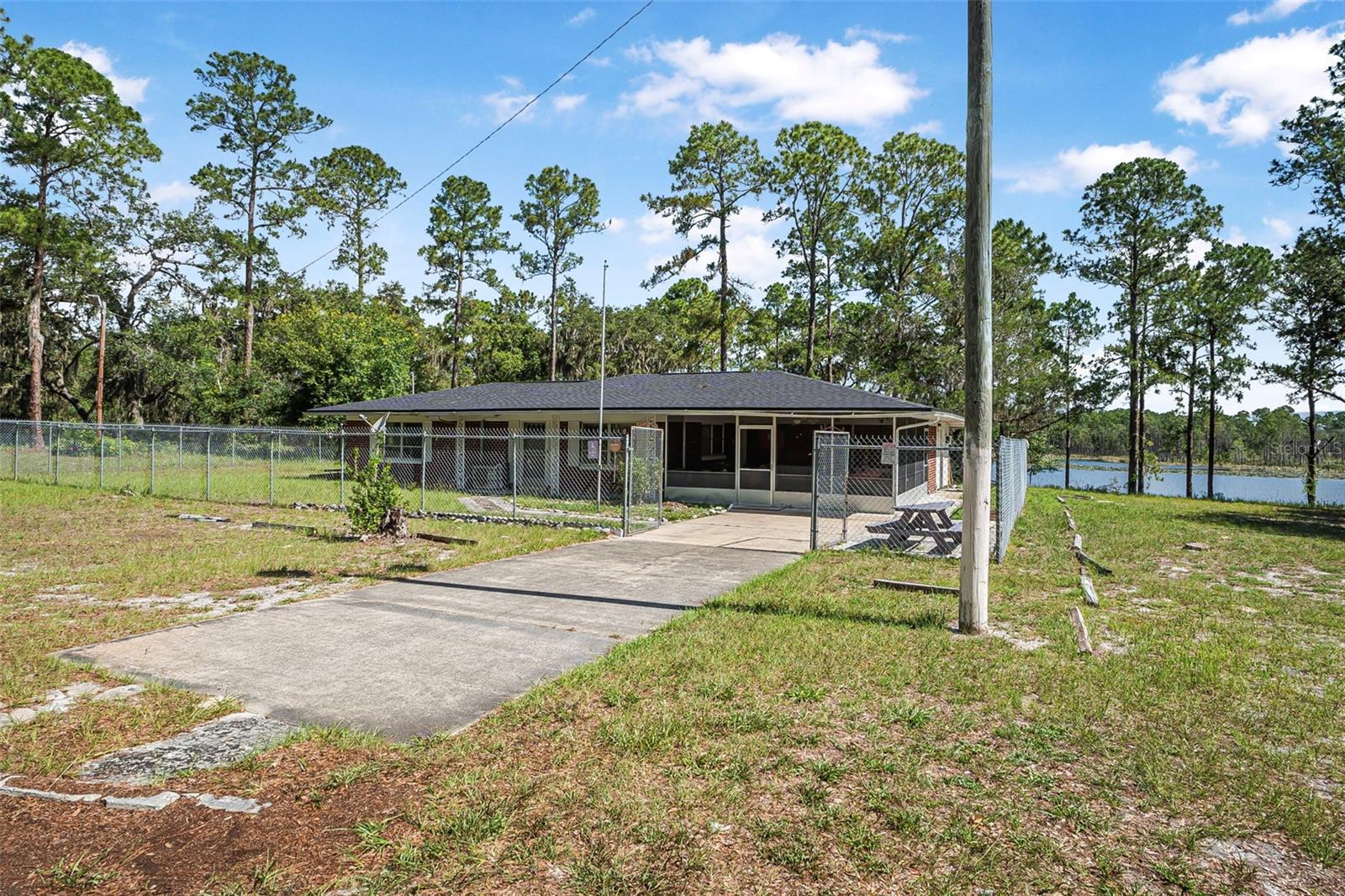 Very Rare 6.06 acres on Lake Doyle. This property has a single family home that was slightly converted and being used as a place of worship. The property can be subdivided into SIX one acre parcels minimum or subdivided how you like or build your dream home. The location is Rural Residential and can be used for many purposes. Across the street is Audubon Park, and soon the East Central Regional Rail Trail (soon to be 52 miles long). In less than 30 minutes you have beautiful beaches, and two airports. Internationally known theme parks, attractions, and the Orlando Airport are less than an hour away! Close to schools, hospitals, shopping, and Lake Monroe, and with new developments all around. Now is the time! Bring your plans and your ideas. All information provided is deemed reliable but is not guaranteed and should be independently verified.