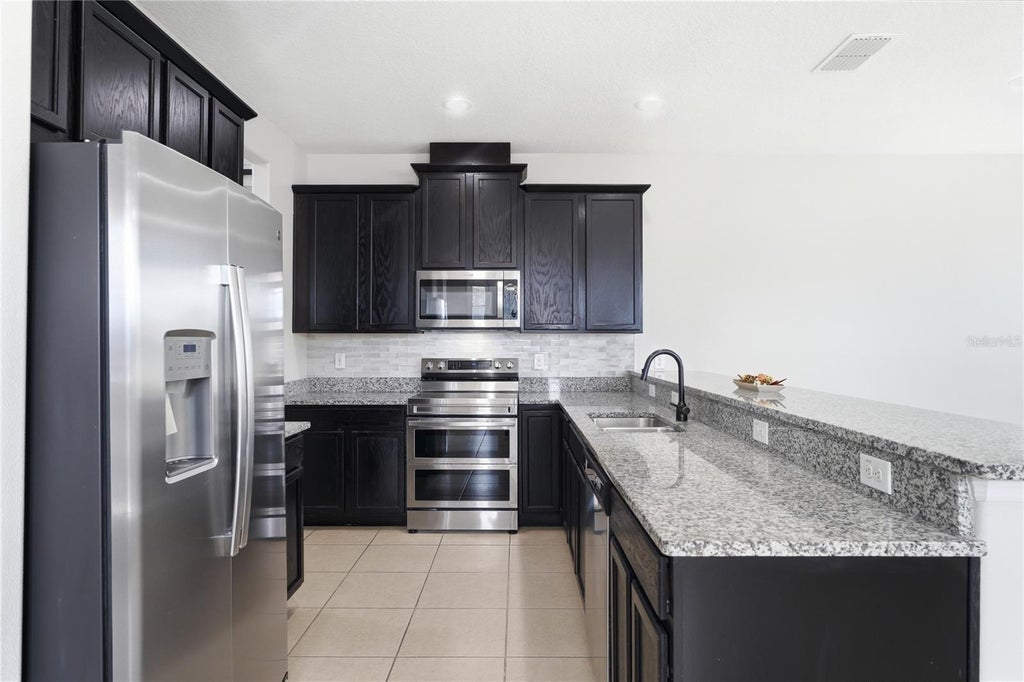 Photo of 2615 Giardino Loop, Kissimmee, FL 34741 (MLS # S5157200)