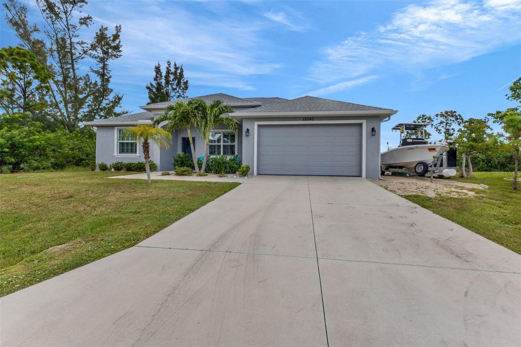 Photo of 15040 Lyneburg Avenue, Port Charlotte, FL 33981 (MLS # C7513268)
