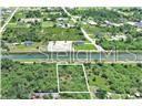 Photo of 1507 Hines Ave, Lehigh Acres, FL 33972 (MLS # O6442270)