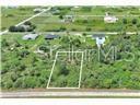 Photo of 1507 Hines Ave, Lehigh Acres, FL 33972 (MLS # O6442270)