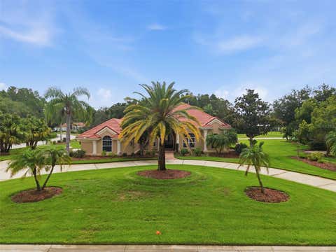 Photo of 18655 Avenue Capri, Lutz, FL 33558 (MLS # TB8529688)