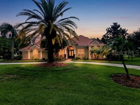 Photo of 18655 Avenue Capri, Lutz, FL 33558 (MLS # TB8529688)