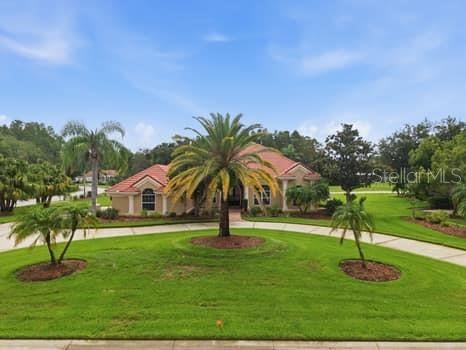 Photo of 18655 Avenue Capri, Lutz, FL 33558 (MLS # TB8529688)