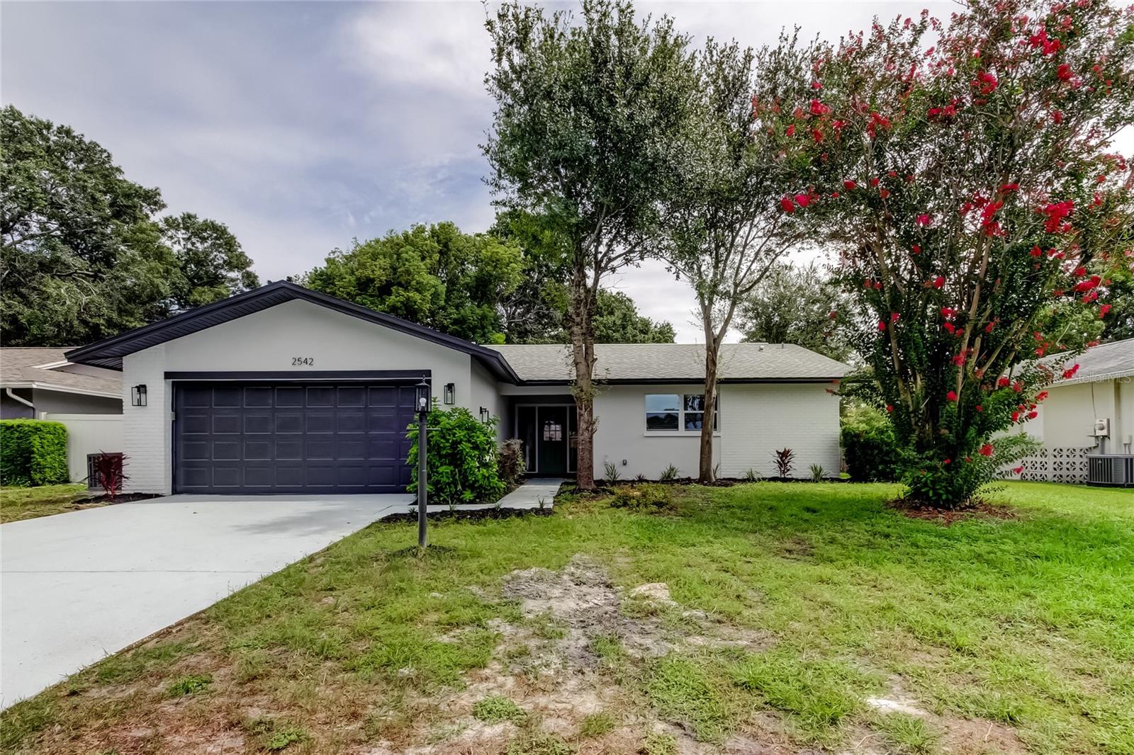 DON'T MISS THIS OPPORTUNITY......MOVE IN READY - Completely renovated, this 3-bedroom, 3-bathroom home offers 1,420 sq. ft. of updated living space. Notable upgrades include a HVAC system (2019), new windows, doors, and blinds, as well as fresh interior and exterior paint. The interior features new ceramic plank tile flooring throughout, remodeled bathrooms with updated fixtures, and a modern kitchen equipped with new stainless steel appliances, contemporary cabinetry, and upgraded lighting and ceiling fans. The floor plan provides a seamless flow from the living room to the kitchen, creating an ideal space for entertaining.
The primary bedroom includes a fully renovated end-suite bath and vanity, while the two additional bedrooms are generously sized and versatile for use as guest rooms, office space, or flex space. Exterior highlights include a fenced backyard, offering ample room for outdoor living, gardening, or future enhancements. This property combines thoughtful updates with a convenient location, making it an excellent opportunity for buyers seeking a turn-key home in Clearwater. The Greenbriar community provides the use of a community pool, game area, pool table, fitness center, and community center. Don’t delay make your appointment today.