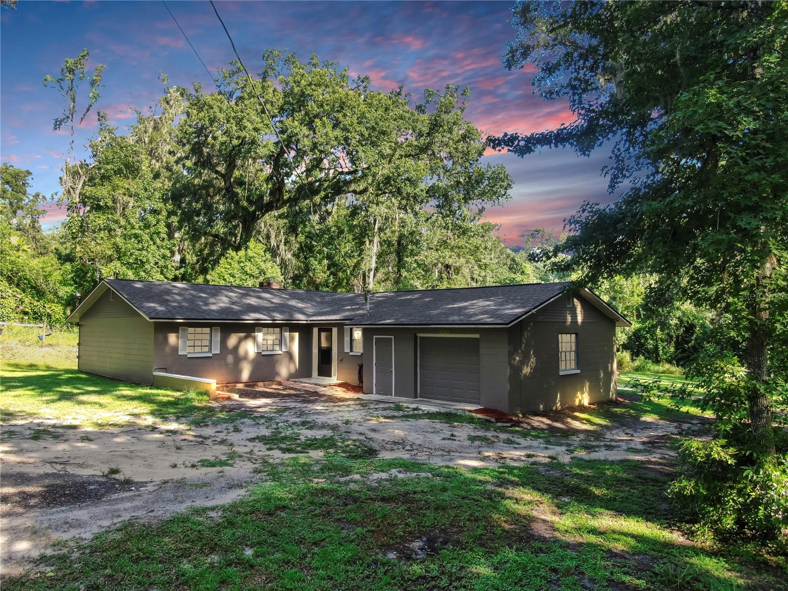 One or more photo(s) has been virtually staged. Charming Dade City Retreat on a Private Road!
Welcome to this beautifully maintained 3-bedroom, 2-bathroom home with a 1.5-car garage, perfectly tucked away on a private road in desirable Dade City. This property offers both peace of mind and modern comfort with thoughtful updates throughout.
Recent upgrades include a brand-new drain field (August 2025), a recently serviced septic system, and a roof replaced just 18 months ago, ensuring lasting value and reliability. Inside, you’ll love the freshly painted interiors that create a bright and inviting atmosphere, complemented by a new dishwasher to make daily living even more convenient.
Nestled in a quiet location with the privacy you’ve been looking for, this home is still just minutes from charming downtown Dade City, local dining, shopping, and schools.
With its combination of recent upgrades and serene setting, this property is move-in ready and waiting for its next chapter.
Don’t miss the opportunity to make 32753 Hideaway Ln your new home — schedule a private showing today!