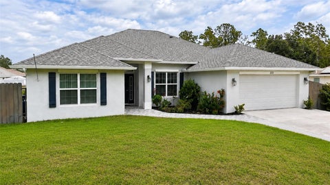 Photo of 372 Rockland Street, Lehigh Acres, FL 33972 (MLS # C7527021)