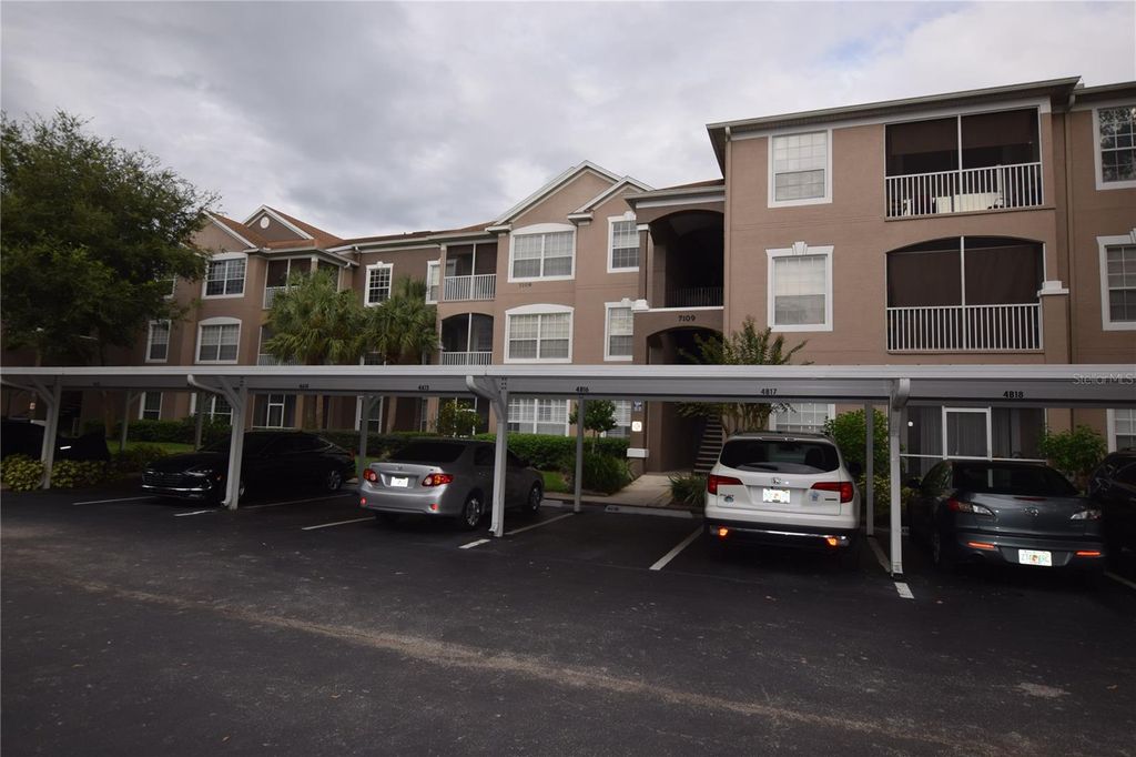Photo of 7109 Yacht Basin Avenue #436, Orlando, FL 32835 (MLS # O6403752)