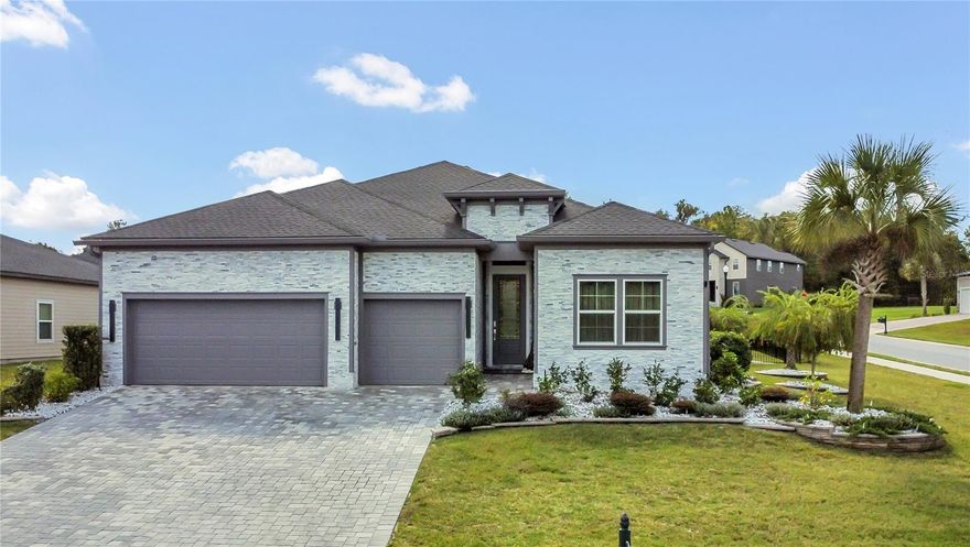 Welcome to Bellechase, one of Ocala’s most exclusive and sought-after guard-gated communities, known for its winding streets, mature oaks, and peaceful atmosphere. This stunning corner-lot, 4-bedroom, 3-bath home with a bonus flex room is the perfect blend of elegance, comfort, and Florida living at its finest. Every inch of this property has been fully upgraded, offering a home that feels brand new from the moment you pull into the full paver driveway, framed by lush professional landscaping and custom stonework that gives the home incredible curb appeal.
Inside and you’re greeted by an open floor plan designed for today’s lifestyle. The spacious living area flows seamlessly into the heart of the home — a modern, fully upgraded kitchen with new stainless-steel appliances, custom cabinetry, and upgraded lighting throughout that ties everything together. The flex room, just off the main space, is perfect for a home office, formal dining area, or playroom, giving you the versatility to make the space fit your family’s needs.
The primary suite is a true retreat, featuring a spa-inspired bathroom with double vanities, a soaking tub, and a large walk-in shower. A second ensuite bedroom provides the perfect setup for guests or in-laws. Throughout the home, you’ll find modern lighting upgrades inside and outside, beautiful flooring, and attention to detail that brings a clean, fresh look to every room.

Outside you'll see what makes this home truly one-of-a-kind. The expansive outdoor living area is designed for year-round enjoyment—whether relaxing with family or entertaining guests. Enjoy your brand-new saltwater pool, surrounded by a fully screened patio and an oversized pergola-covered area perfect for lounging in the shade. Fire up the outdoor kitchen for weekend barbecues, gather around the custom fire pit on cool evenings, and take in the resort-style landscaping that surrounds the entire property—a $50,000+ investment in landscaping alone!
Additional features include an EV charger hookup in the garage, modern new exterior lighting, and the peace of mind that comes with living in one of Ocala’s most desirable and secure neighborhoods. Bellechase offers wide streets, beautiful walking paths, and a true sense of community, all just minutes from top-rated schools, fine dining, shopping, and some of Central Florida’s most beautiful natural areas.
This is more than just a home — from the high-end finishes to the amazing outdoor spaces, every detail has been designed for comfort, style, and lasting enjoyment. Don’t miss your chance to own this incredible property in Bellechase — homes like this do not come along often!