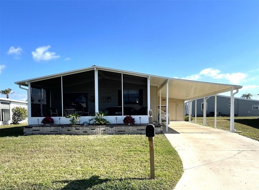 Lovely turn-key furnished, 2 bedroom home with welcoming curb appeal in the premier community of Harbor Isles.  Harbor Isles is a land owned, pet friendly, retirement community with five star amenities and activities year round.  The marina includes boat slips, boat launch, canoe/kayak launch, fishing station, pavilion and an active boat club.  Upon entering the home you will love the open concept with vaulted ceilings, beautiful Pergo floors, updated honey oak kitchen cabinets and matching dining room cabinet storage.  Both bedrooms have walk-in closets, the primary bedroom enjoys an en-suite bath.  Both bathrooms have  tile floors, new toilets and lighting.  The guest bedroom is just steps from the guest bath.    Direct access from the living room to the new screened front lanai that is great for sipping your morning or evening beverages and people watching! 

The shingle roof and carport were installed 2023.  Hot water heater has been replaced and is located in the spacious double shed.  Ten tie downs replaced in 2013, A/C 2025 and all windows except the kitchen have been replaced.  The entire living area has plywood sub-floors. 

Convenient to beaches, shopping, dining, Atlanta Braves ball field, downtown Wellen Park, Sunseeker Resort, interstate and airports.  Call today for your personal or virtual viewing.