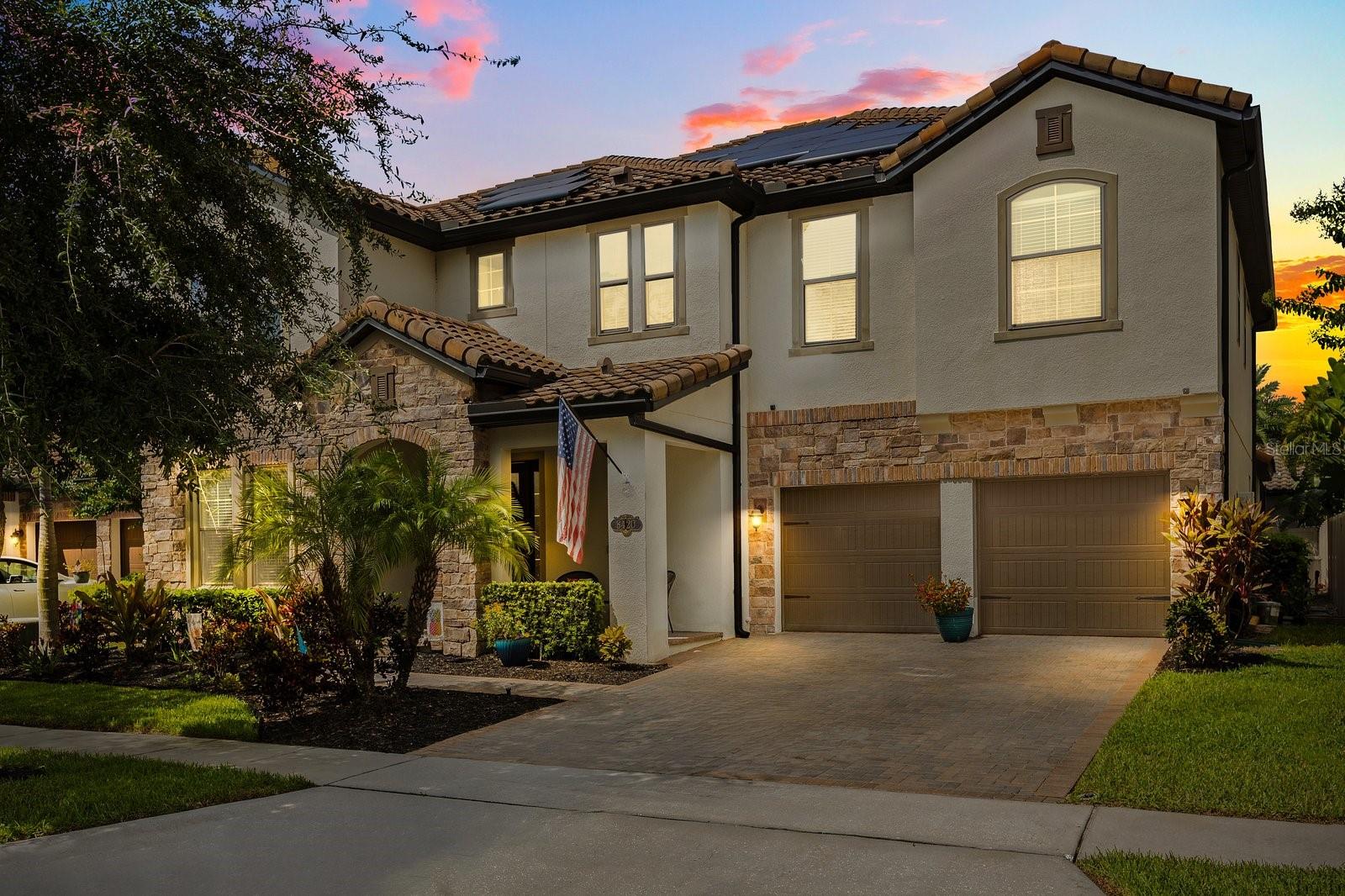 MAJESTIC Mediterranean-Style Estate in Windermere Isle — 2 Stories, 5 Bedrooms, Resort-Caliber Backyard!! Prepare to be awestruck by this expansive 2 story home nestled in this luxurious community of lush conservation landscapes, impeccably manicured common areas, a sparkling resort-style heated self-cleaning pool and spa with a custom outdoor kitchen that’s convenient proximity to Disney, upscale shopping and some of the best dining in Orlando. With 5 bedrooms, 4.5 bathrooms, a private office, loft AND bonus room, this home delivers space, flexibility and elegance at every turn. The exterior features elegant Mediterranean-style stone accents and a 2-car garage. Step inside to discover two-story living room ceilings and an open floor plan where wood-look ceramic tile flows seamlessly throughout the main level with a massive primary bedroom on the first floor for owners convenience Entertain with ease in the eat-in gourmet kitchen outfitted with a massive island, stone countertops, walk-in & butler’s pantries, towering cabinetry and double ovens alongside premium appliances. The formal dining room is elevated by a coffered ceiling—creating an elevated atmosphere for both relaxed family nights and stylish entertainment. But the real showstopper? The STUNNING TROPICAL BACKYARD, your personal oasis featuring a private pool with lounge shelf, elegant water features, built-in spa, and custom seating shaded by a covered back porch with a fully equipped outdoor kitchen, perfect for entertaining under the Florida sun. Upstairs leads you to four additional bedrooms, including a second private ensuite and a Jack-and-Jill set-up, plus a spacious bonus room ideal for media, play or overflow guests. Living in Windermere Isle means access to a serene, amenity-rich lifestyle and a lawn that is maintained by the association. This is your moment to embrace grandeur, space, and Florida living at its finest. Don’t wait—schedule your private tour today and experience the magic in person!