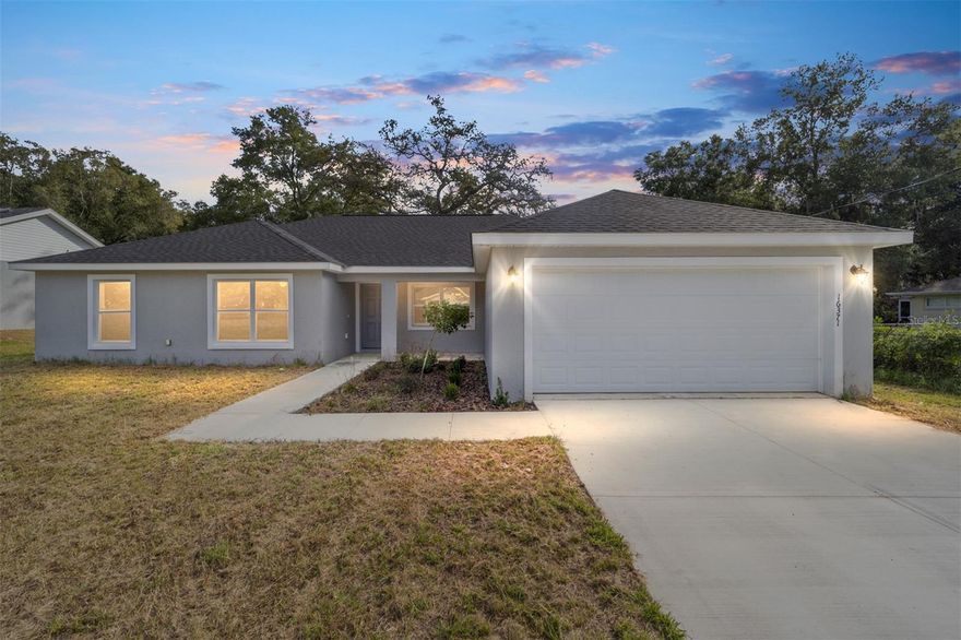 Beautiful new construction concrete block and stucco 3 bedroom 2 bath home with den and a 2 car attached garage. Luxury vinyl flooring through out, ceiling fans, covered lanai, granite counters and breakfast island seating, additional dining area and open great room plan. Master en-suite bathroom with walk in closet, dual sinks and granite counters. Well and septic, no HOA fees. Appliance package includes range, refrigerator and dishwasher.