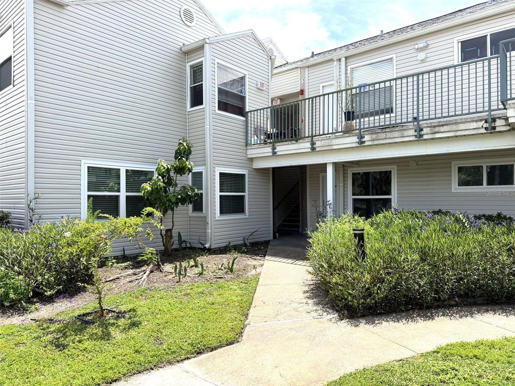 Photo of 2524 Woodgate Boulevard #102, Orlando, FL 32822 (MLS # S5157094)