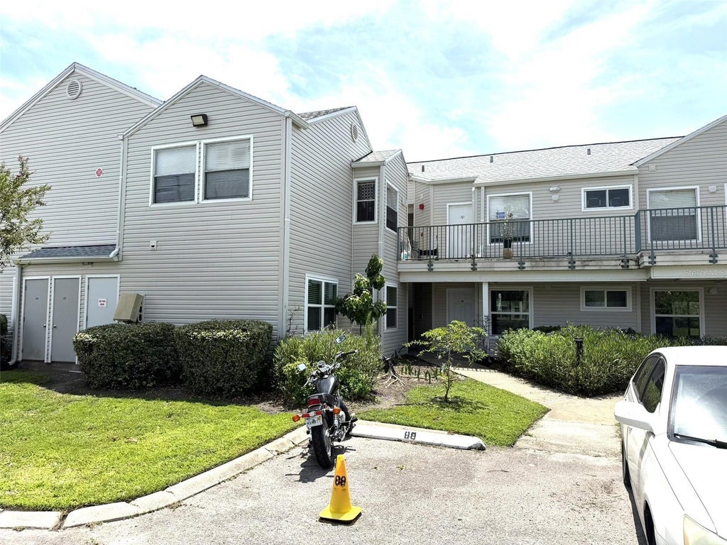 Photo of 2524 Woodgate Boulevard #102, Orlando, FL 32822 (MLS # S5157094)