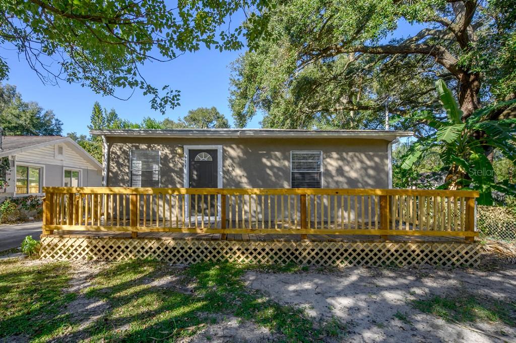 Welcome to your new haven in the heart of Seminole Heights! This delightful and cute 2-bedroom, 1-bathroom home blends comfort and style, offering a welcoming retreat with a touch of classic charm. As you step inside, you'll immediately notice the inviting ambiance. The cozy living room flows seamlessly into the kitchen, perfect for both relaxing and entertaining. Large windows throughout ensure an abundance of natural light, highlighting the home's warm and welcoming atmosphere. The shared bathroom features clean and contemporary finishes. One of the standout features of this property is the expansive front deck, where you can enjoy your morning coffee or unwind in the evening. The large, fenced yard offers endless possibilities for outdoor activities, gardening, or simply soaking up the Florida sunshine. Located in the vibrant and historic Seminole Heights neighborhood, you'll enjoy proximity to a variety of local dining, shopping, and entertainment options. With its friendly community atmosphere and convenient location, this home is perfect for anyone looking to experience the best of Tampa living.
