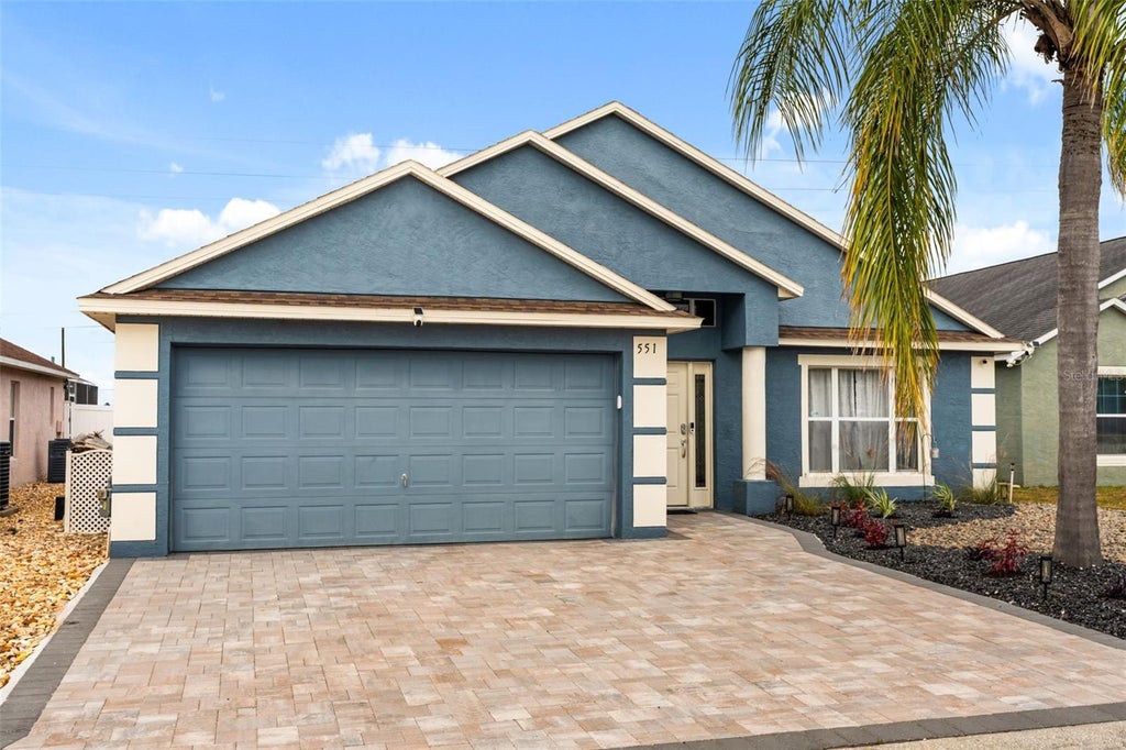 Photo of 551 Majesty Drive, Davenport, FL 33837 (MLS # O6452603)
