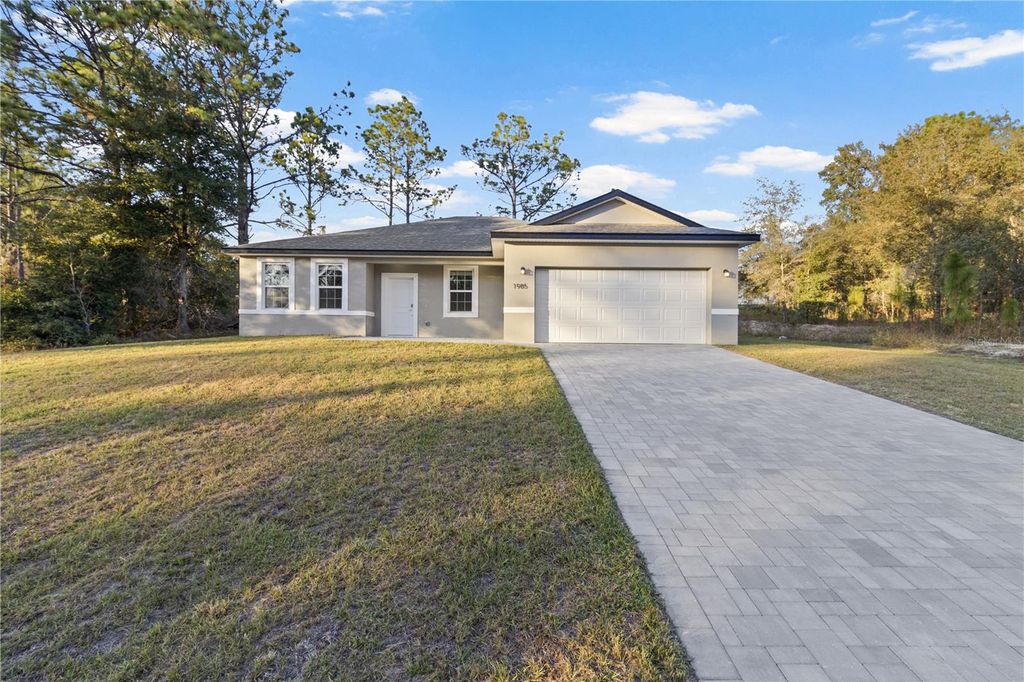 Photo of 1985 W Corrine Street, Citrus Springs, FL 34434 (MLS # O6362199)