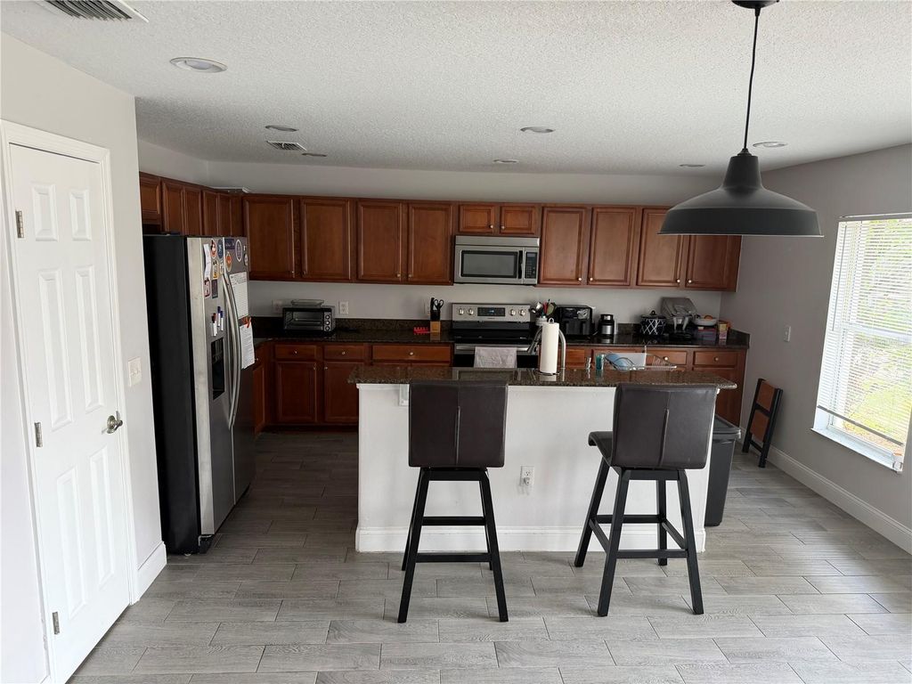 Photo of 319 Verdi Street, Davenport, FL 33896 (MLS # S5146920)