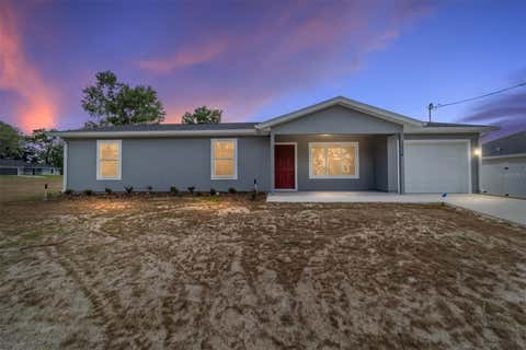 Photo of 13078 NE 7th Loop, Silver Springs, FL 34488 (MLS # OM723634)