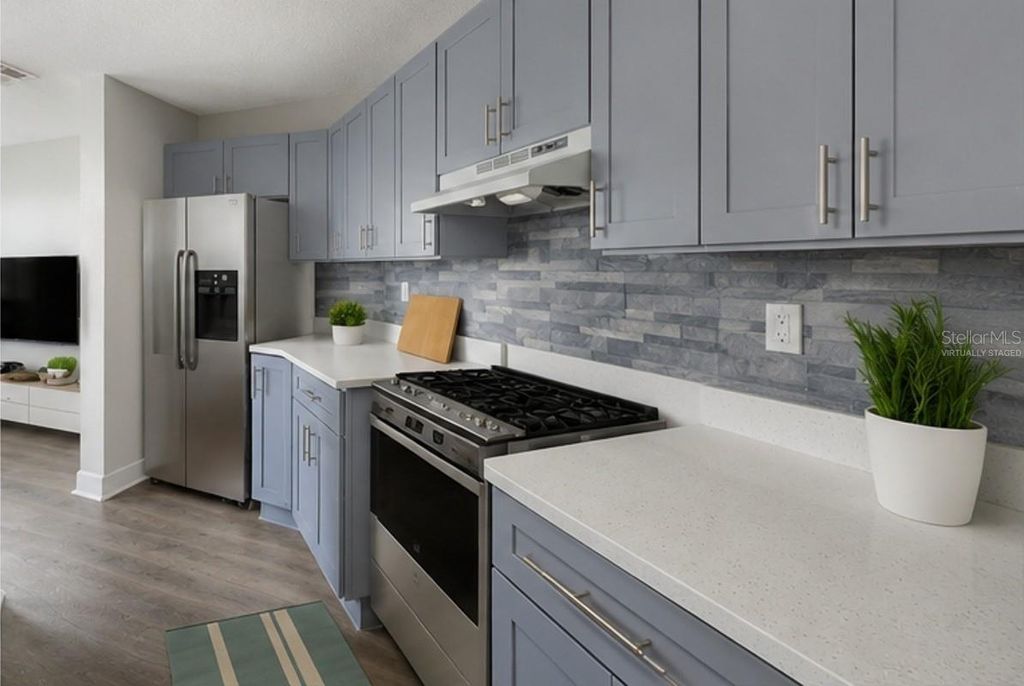 Photo of 2540 Woodgate Boulevard #106, Orlando, FL 32822 (MLS # O6409780)